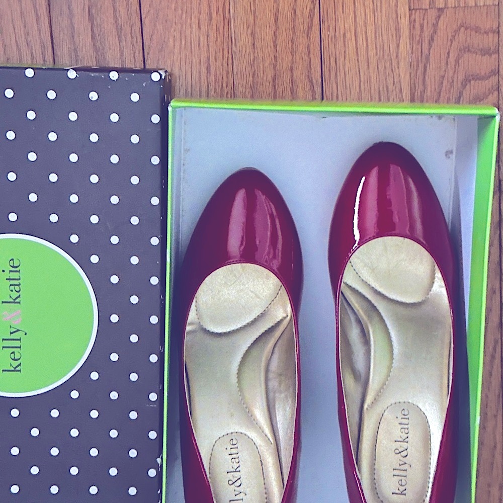 Comfortable red patent leather heels. Heel height measurement is 3 inches.